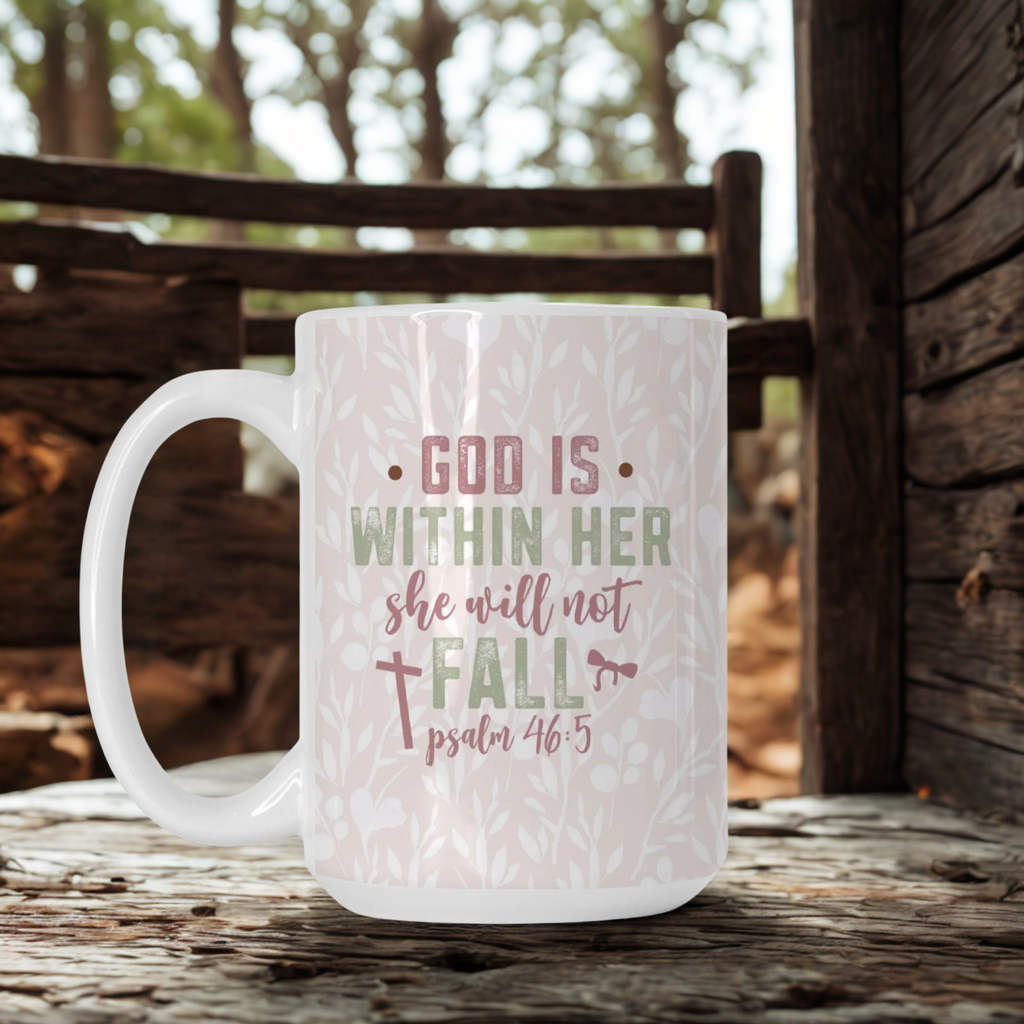 White mug with motivational quote on a wooden surface outdoors