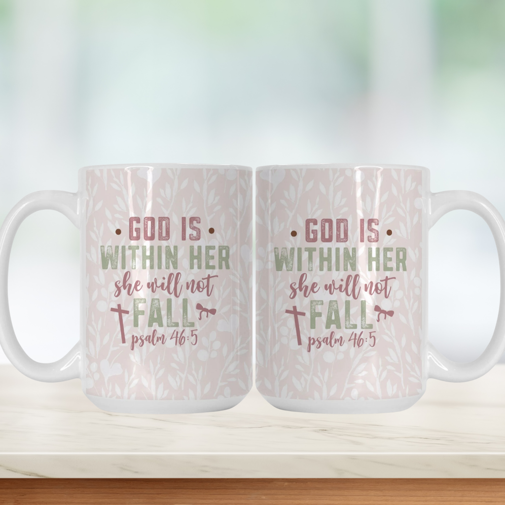 Two white mugs with a pink floral pattern and text 'God Is Within Her She Will Not Fall, Psalm 46:5' on a light background
