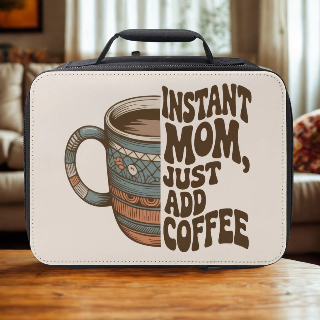 Lunch bag with a coffee cup graphic and text 'Instant Mom, Just Add Coffee' on a wooden surface.