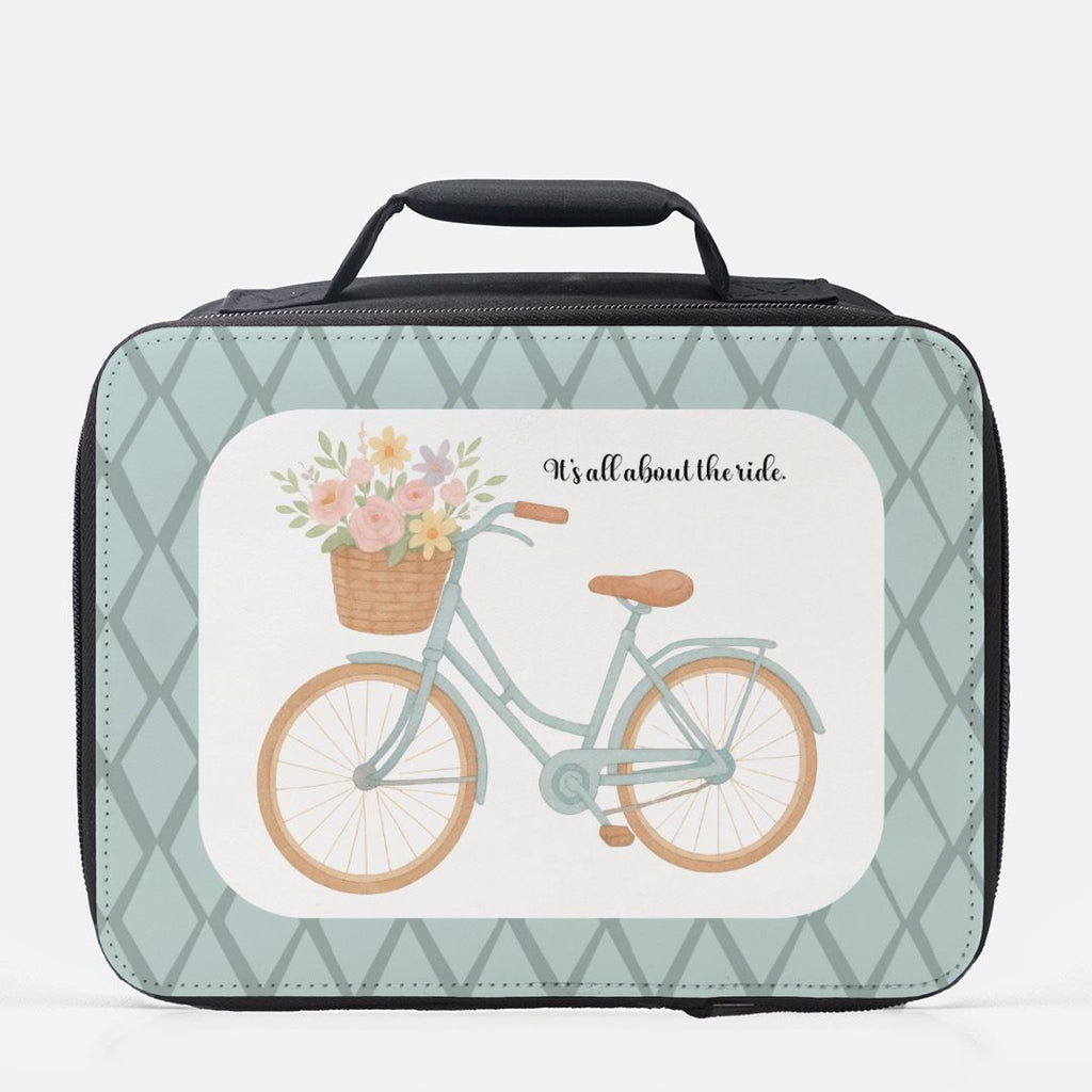 Lunch bag with bicycle and flowers design on a light blue background