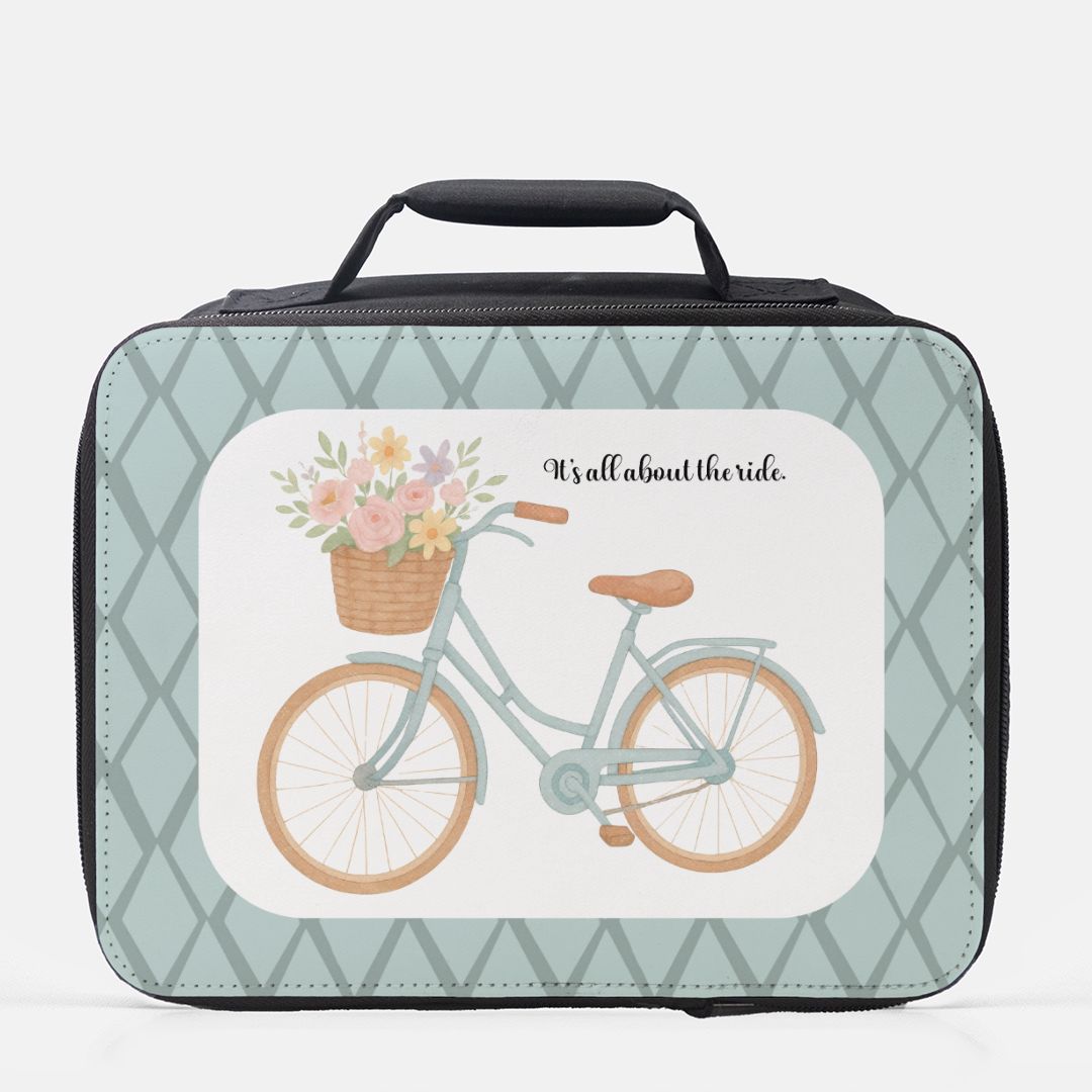Lunch bag with bicycle and flowers design on a light blue background