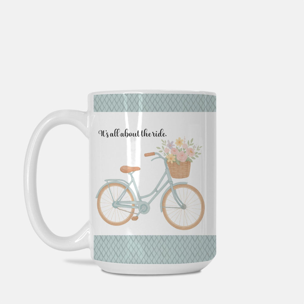 Mug with bicycle and floral design on a white background