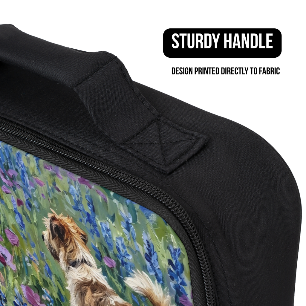 Black lunch bag with a dog and floral design on fabric, featuring a sturdy handle.