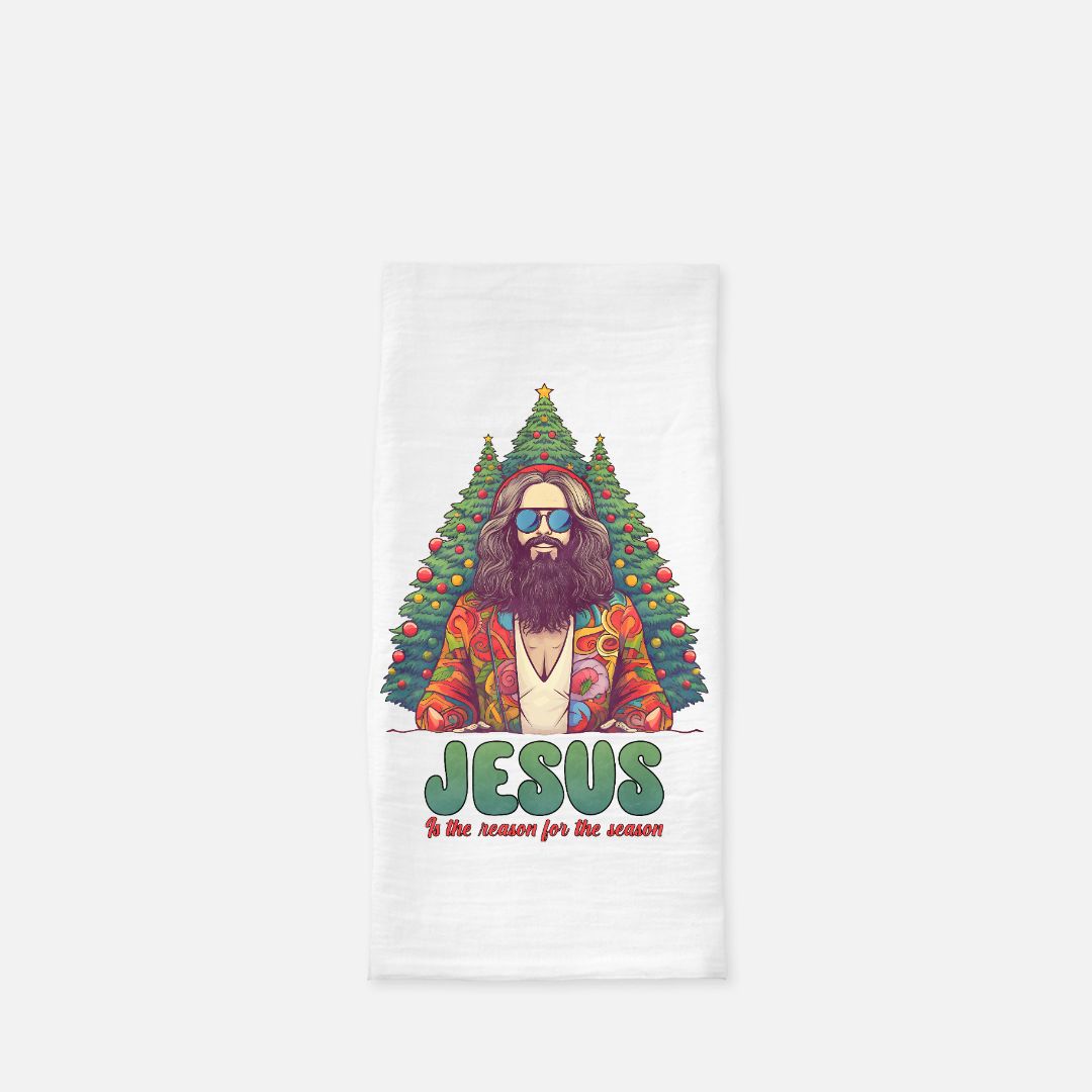 Extra large tea towel with a design of a person with a Christmas tree as a head, wearing sunglasses and a colorful jacket, with 'Jesus is the reason for the season' text.