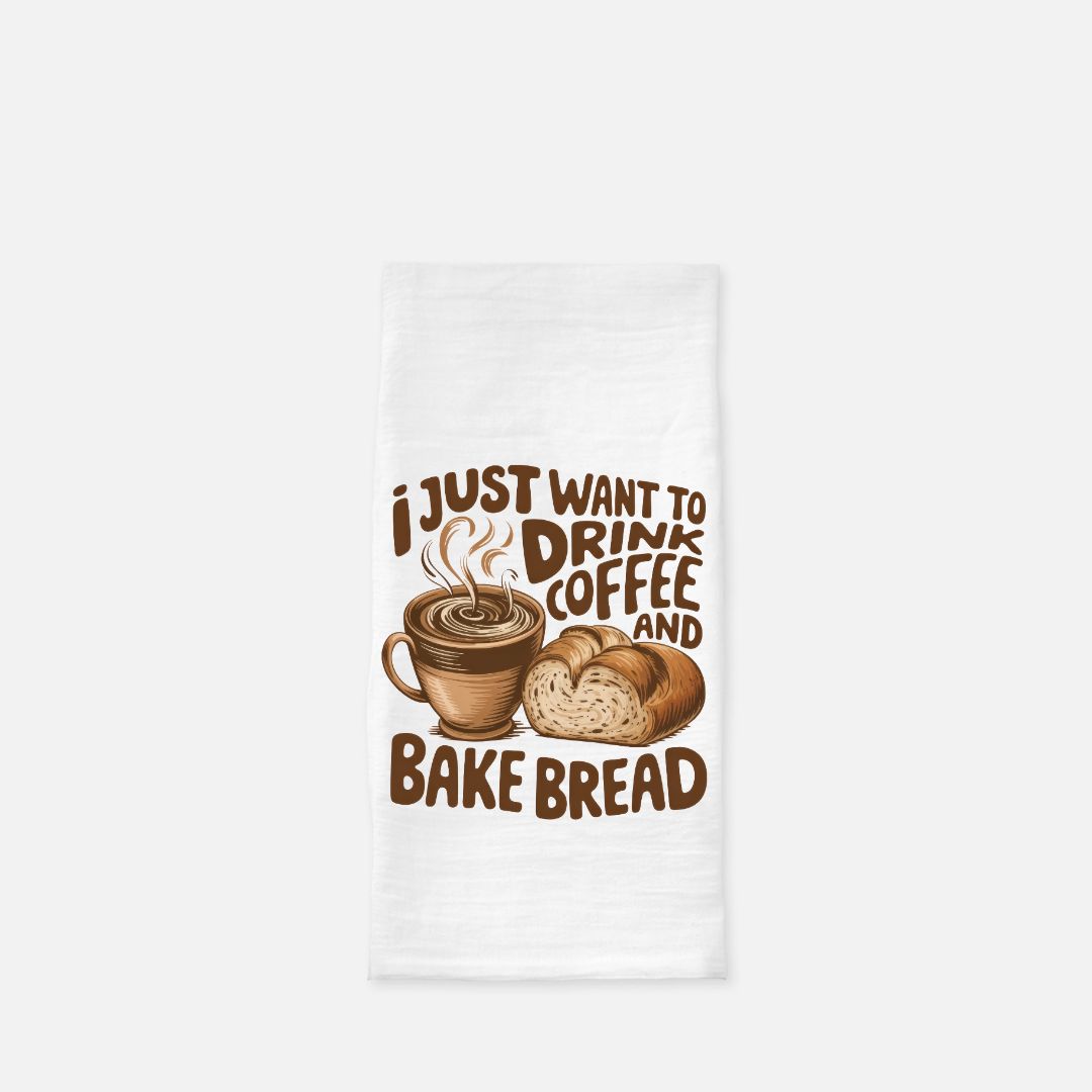 White towel with brown text and graphics of a coffee cup and bread on a white background