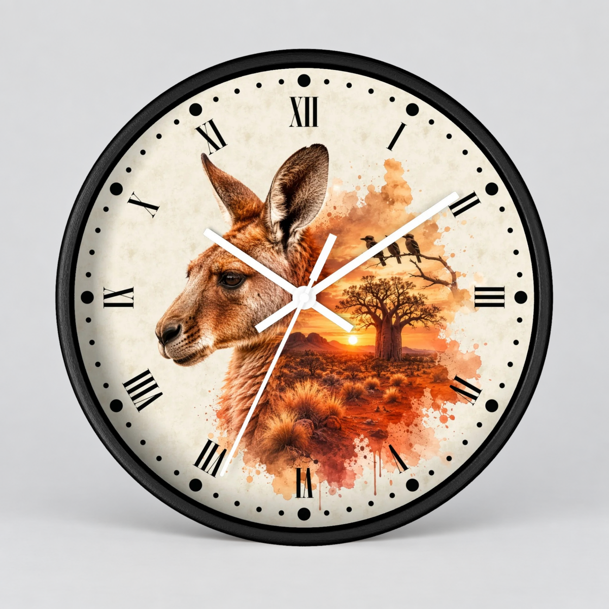 A round wall clock with a black frame and a cream-colored face featuring a kangaroo portrait, a tree, birds, and an orange sunset watercolor design. The clock is shown against a neutral light gray background.