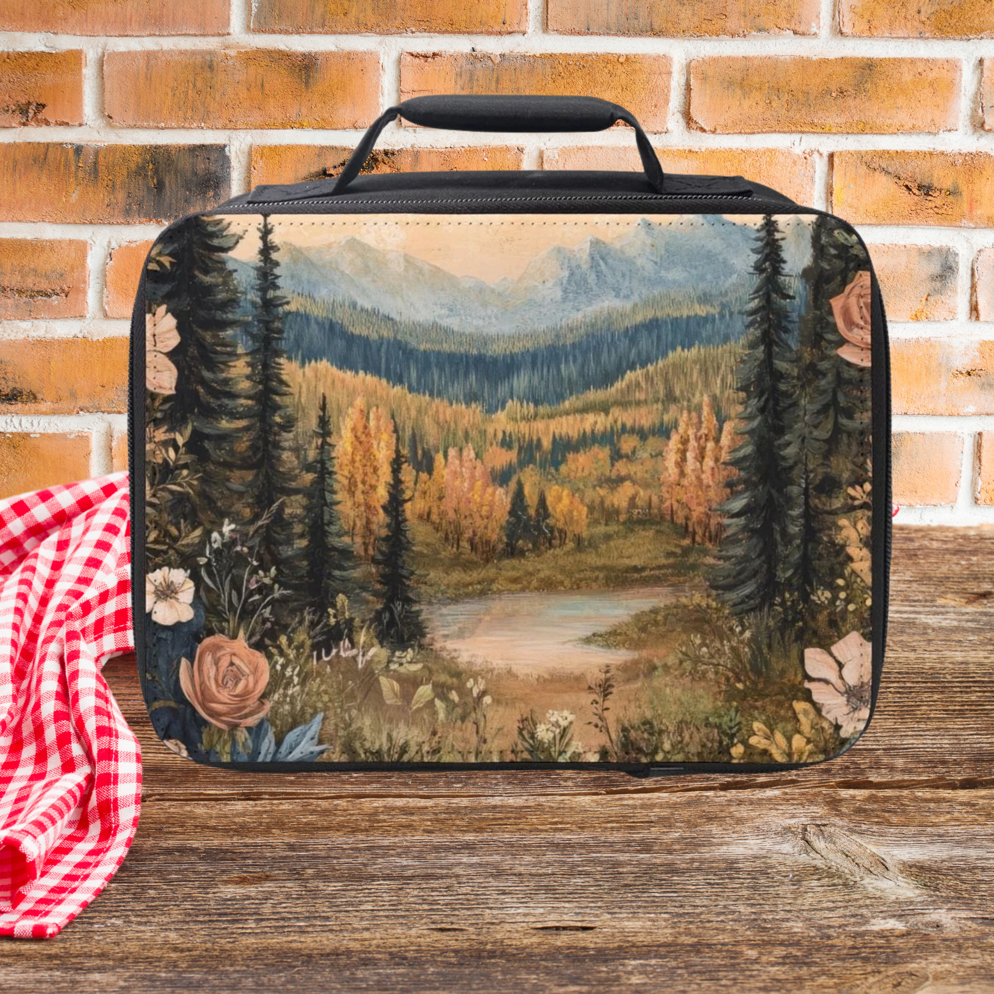 Lunch bag with nature design on a wooden picnic table  and brick wall background