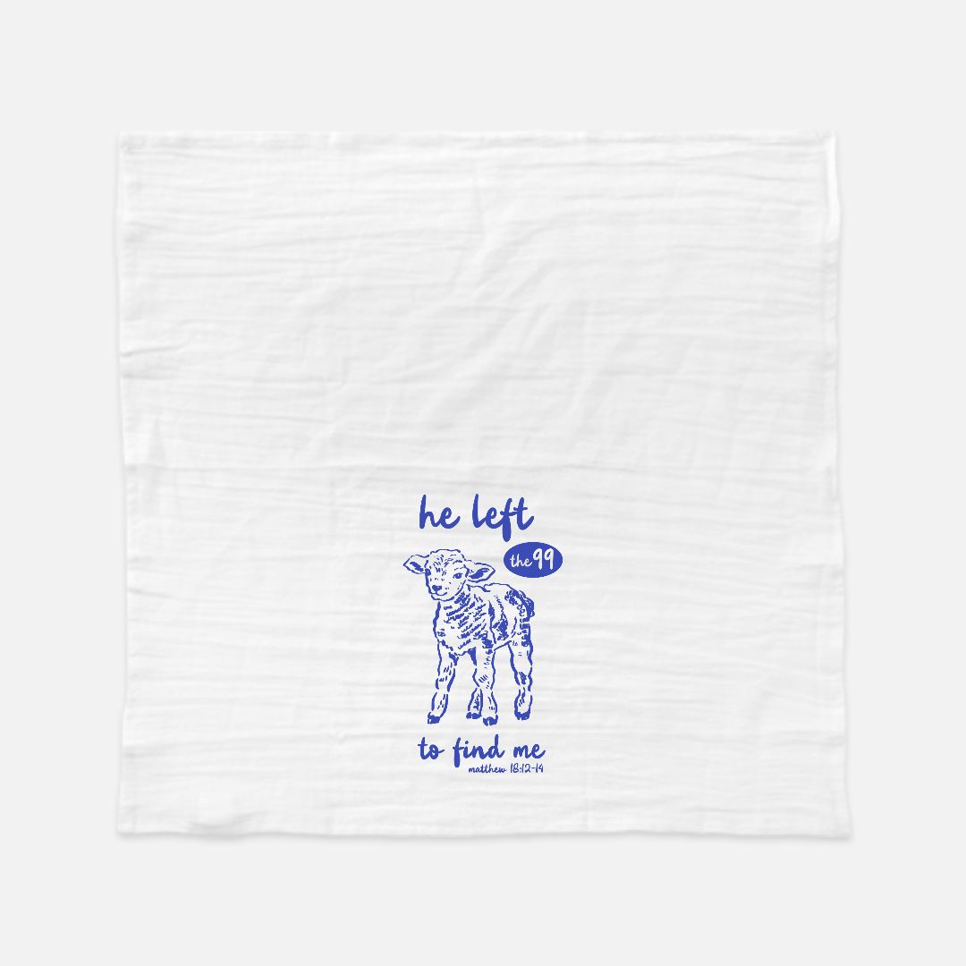 White tea towel with blue graphic and text on a white background
