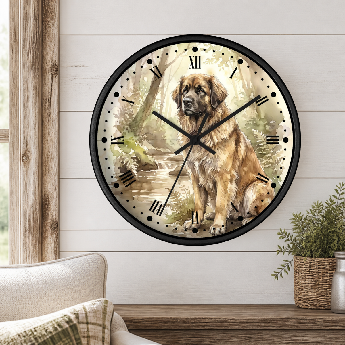 A round wall clock with a black frame and a printed illustration of a Leonberger dog in a forest setting, mounted on a white shiplap wall above a wooden mantel with a plant and part of a sofa visible.