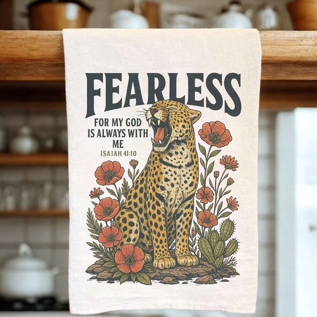 Tea towel with a leopard design and 'Fearless' text in a kitchen setting