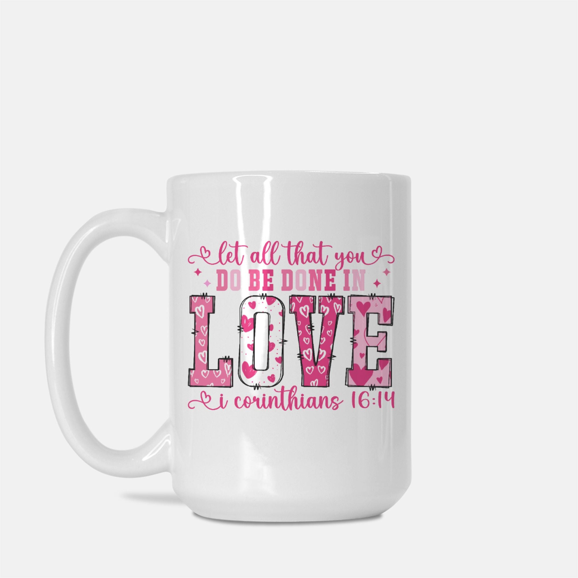 White mug with pink text and design on a white background