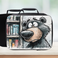Black lunch bag with a cartoon bear design on a white background