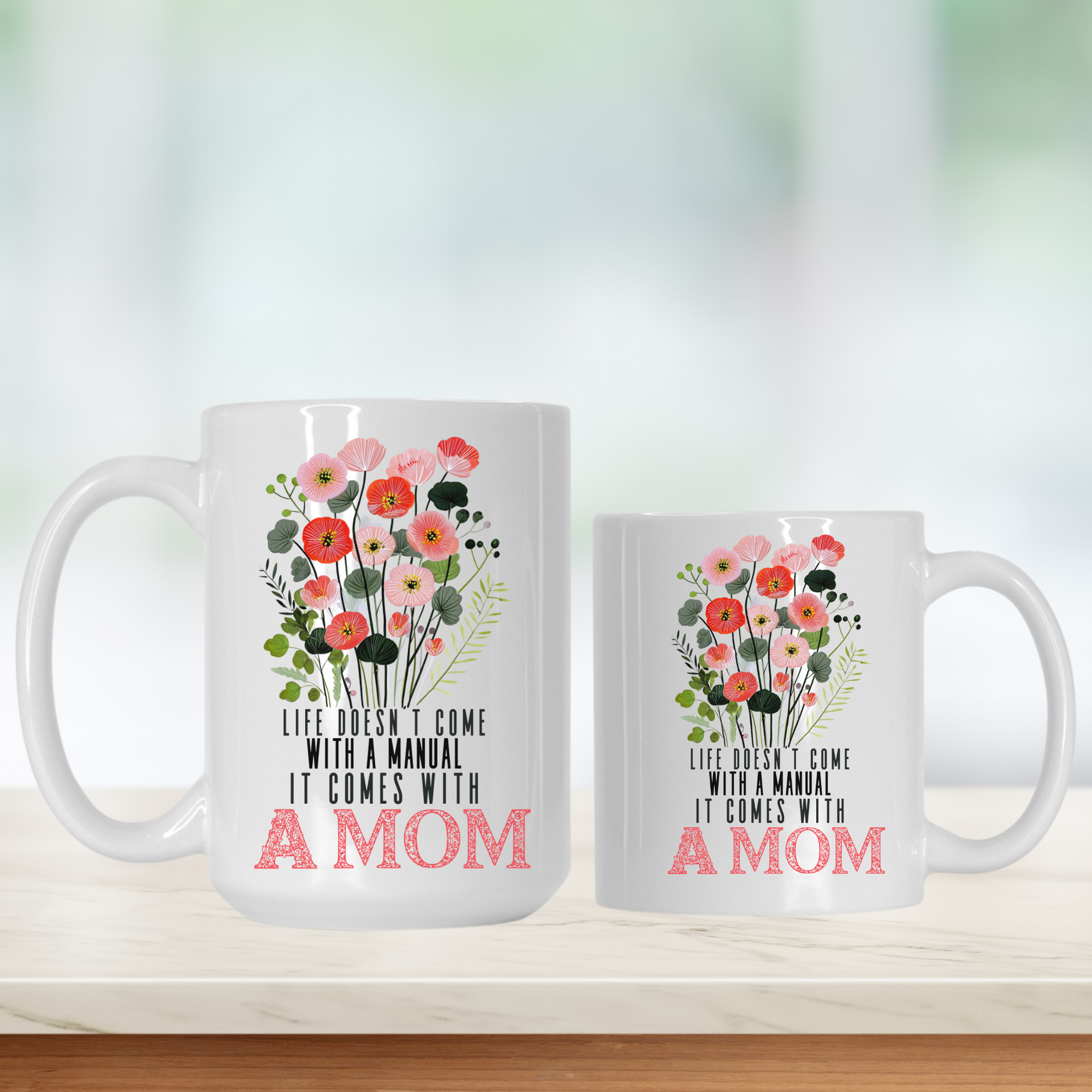 15oz and 11oz white mugs with floral designs and text about moms on a light background