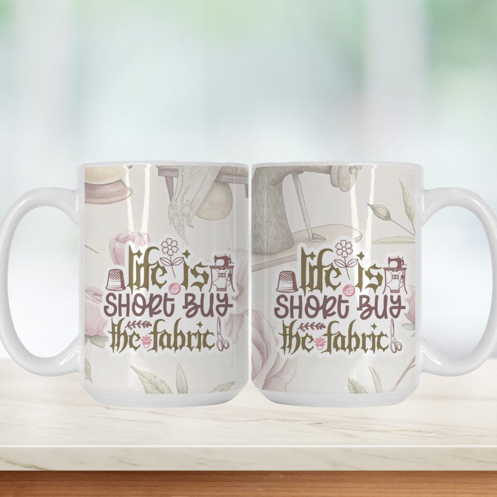 Two white mugs with fabric-themed design and text on a light background