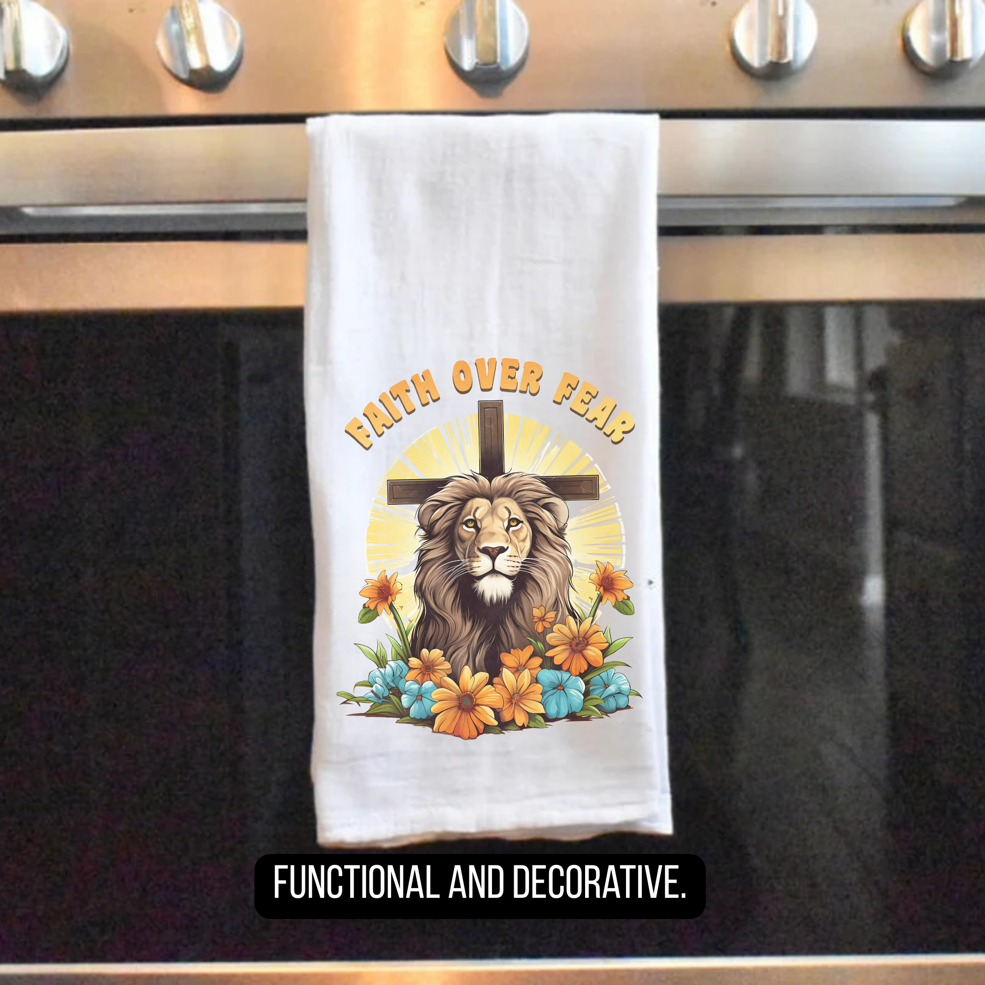 Tea towel with a lion, cross, and flowers design on an oven door.