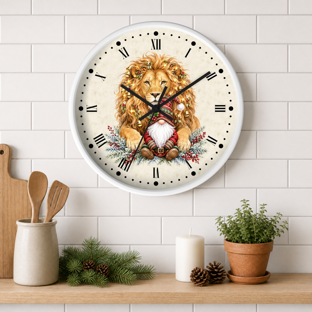 A round wall clock with a white frame hangs on a white subway tile wall above a wooden shelf. The clock face features a detailed illustration of a golden lion wearing a Santa hat and scarf, surrounded by a wreath and a white beard.