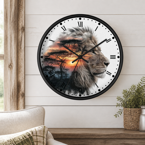 A round wall clock with a black frame hangs on a white shiplap wall above a wooden table. The clock face features a lion portrait blended with an African savanna sunset scene.