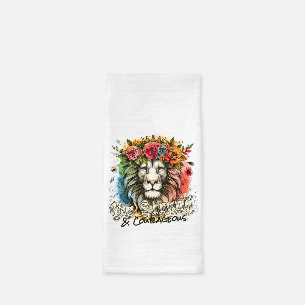 White tea towel with a colorful lion design and text on a white background