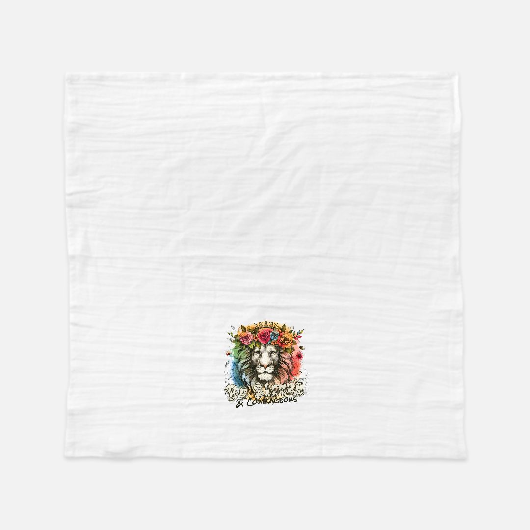 White tea towel with a colorful lion design and text on a white background