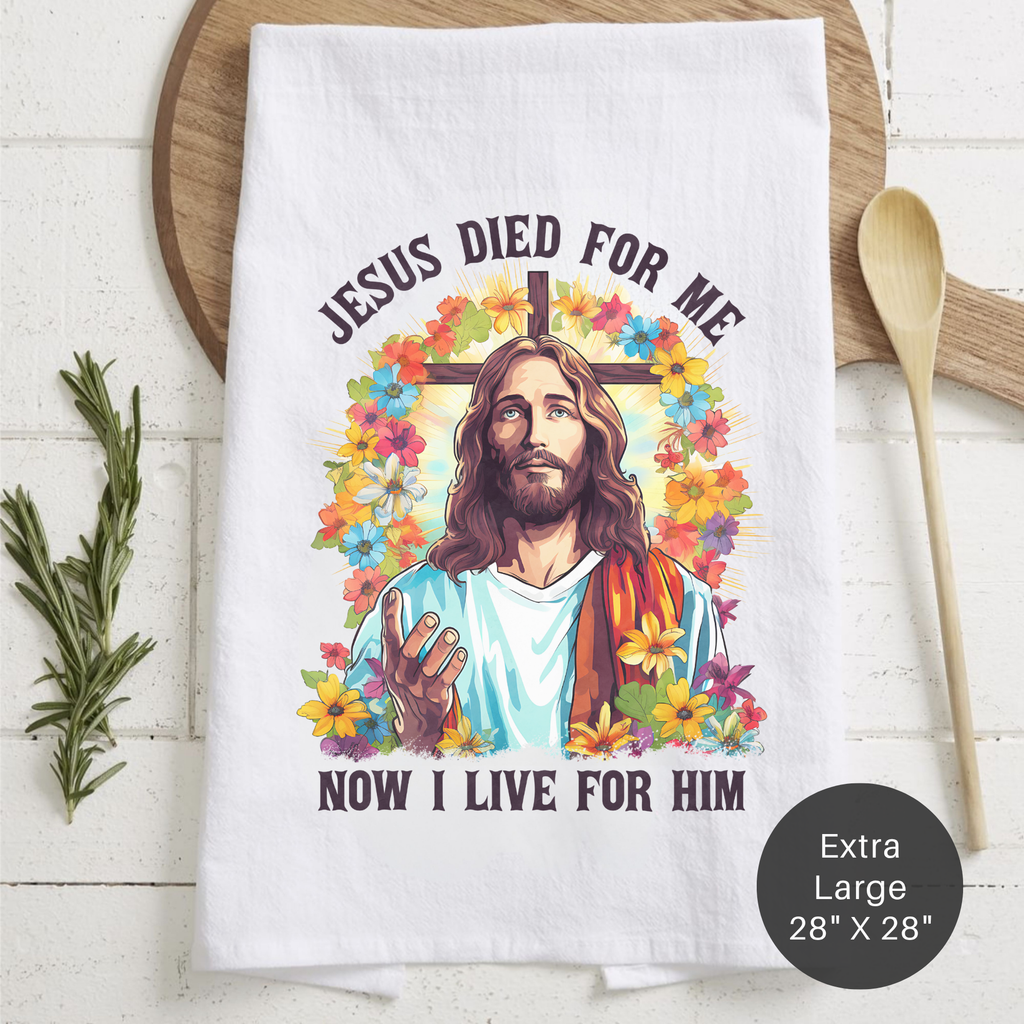 Tea towel with Jesus design and text on a wooden surface