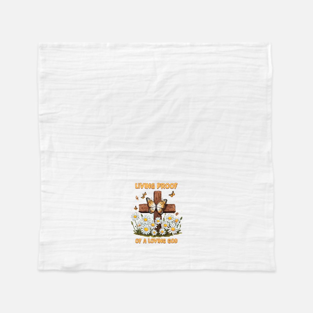White tea towel with a graphic design of a cross, flowers, and text on a white background