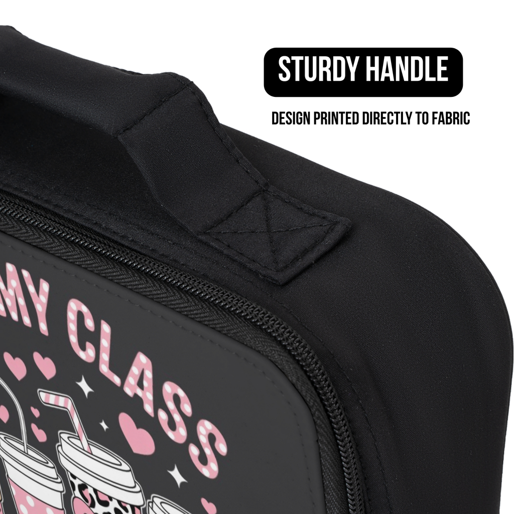 Black lunch bag with pink text and graphics, featuring a handle and text about a sturdy handle and design printed directly to fabric.