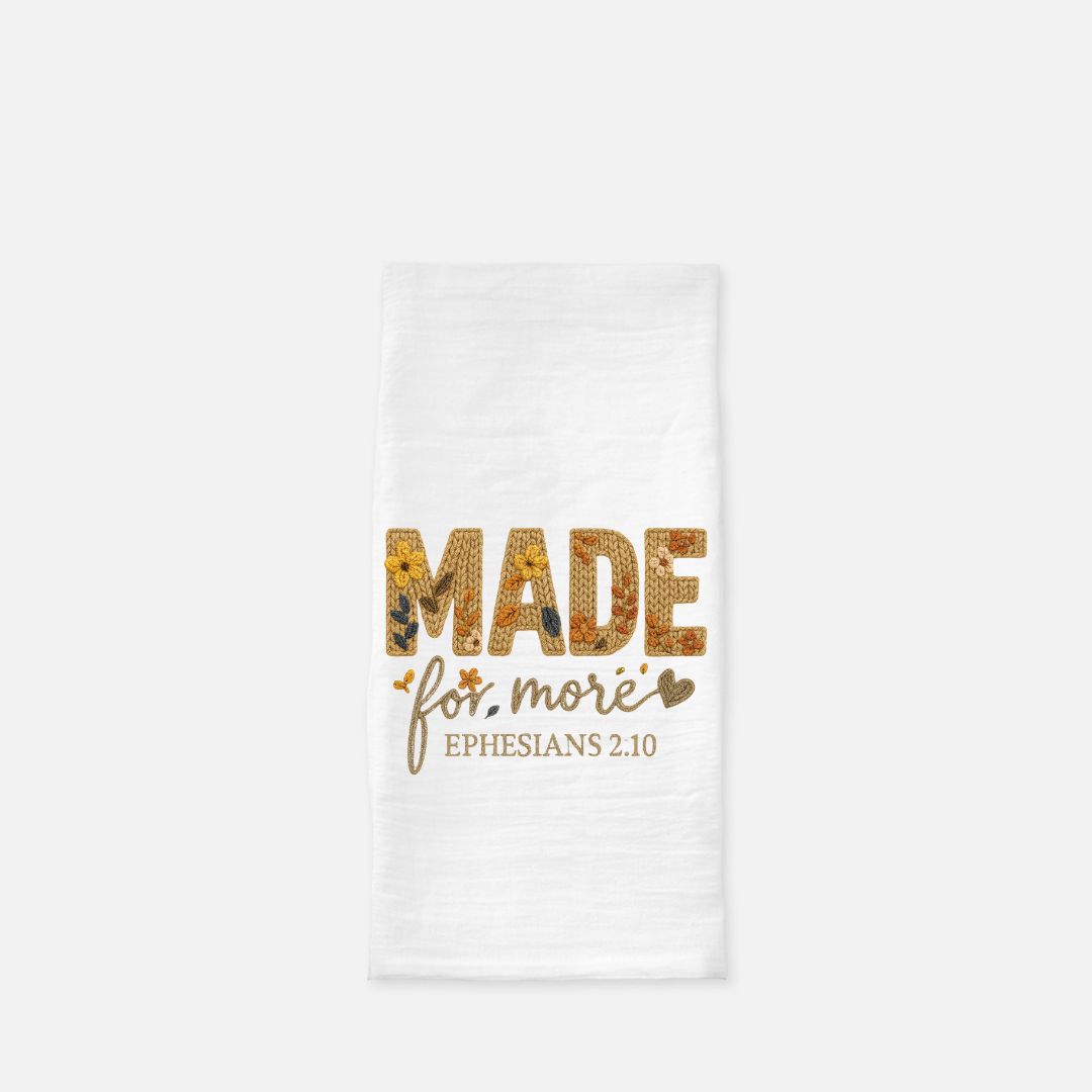White towel with 'MADE for more EPHESIANS 2:10' text on a white background