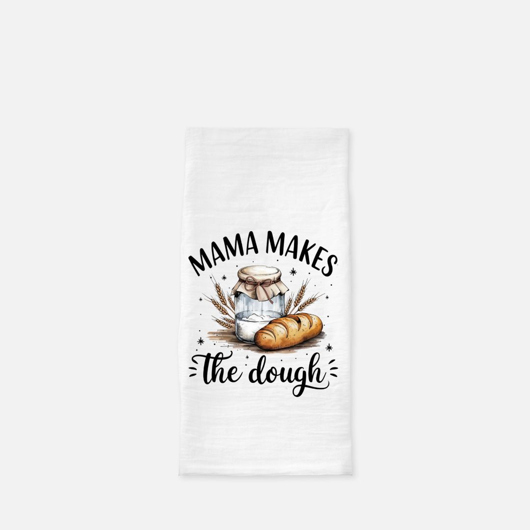 Kitchen towel with bread and jar design and 'Mama makes the dough' text on a white background