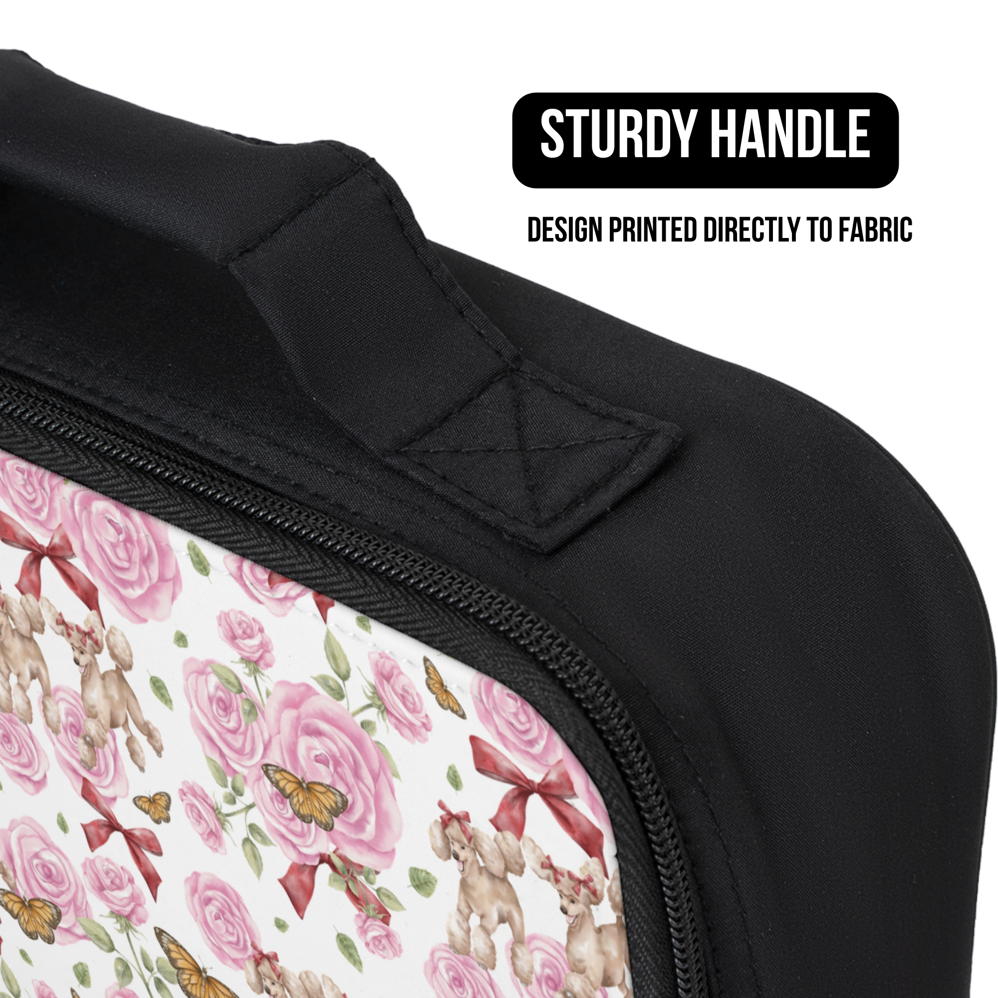 Floral-patterned lunch bag with a sturdy handle and text indicating design on fabric.