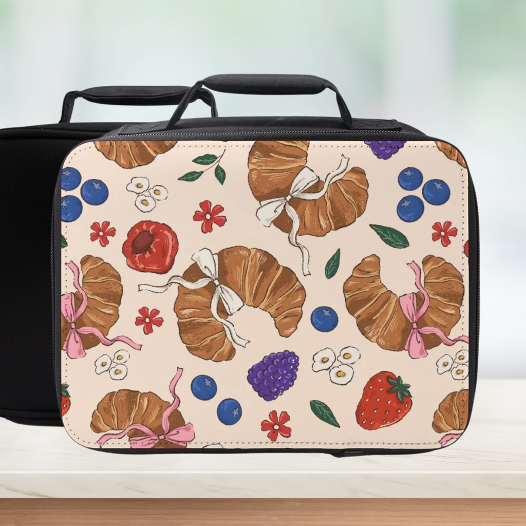 Lunch bag with croissant and flower pattern on a white background