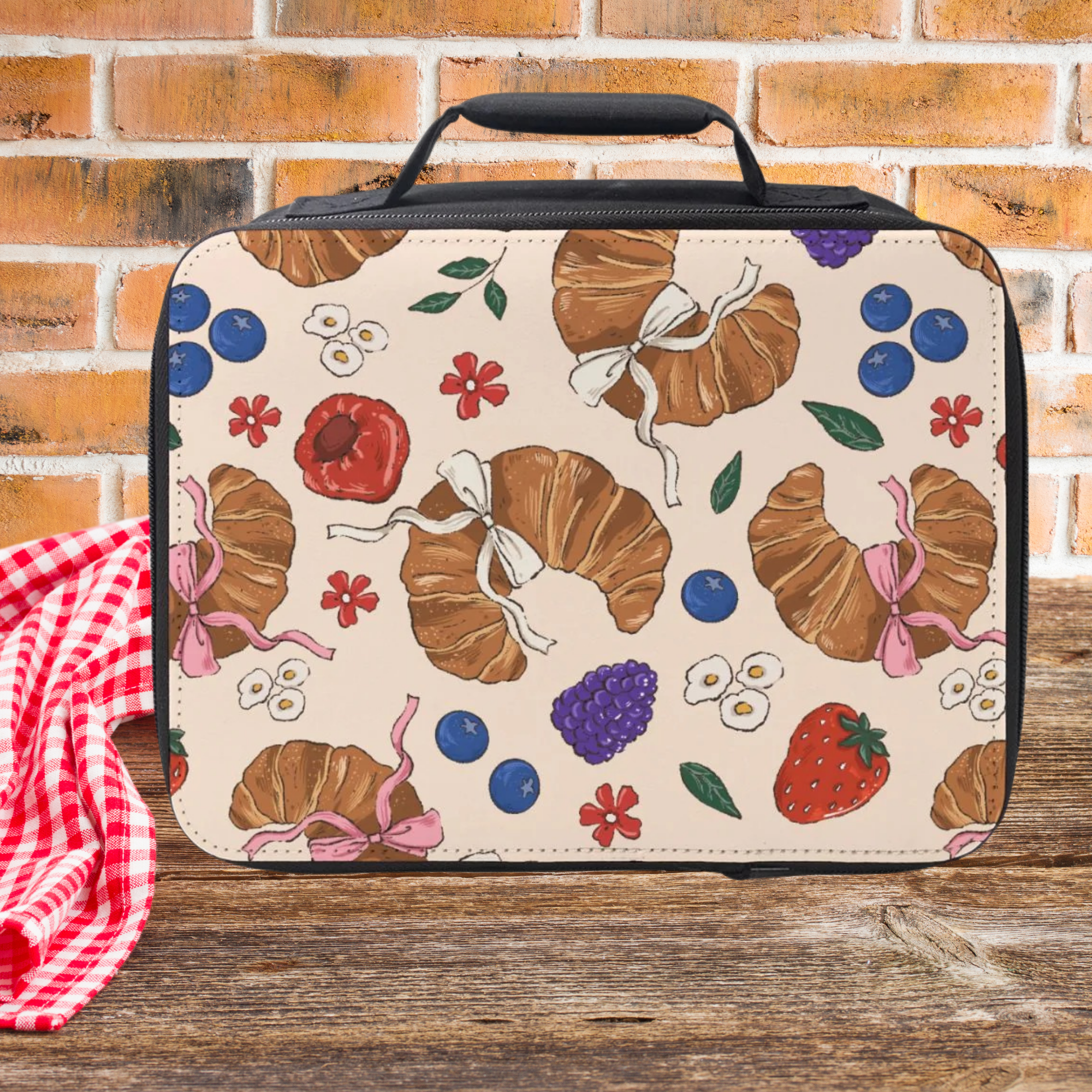 Lunch bag with colorful pattern on a wooden surface and brick wall background