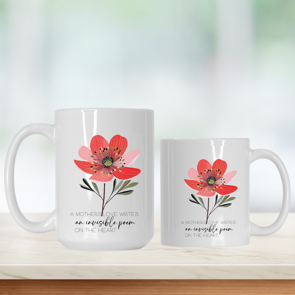 15oz & 11oz white mugs with red floral designs and text 'A Mothers Love writes and invisible poem on the heart' on a light background 