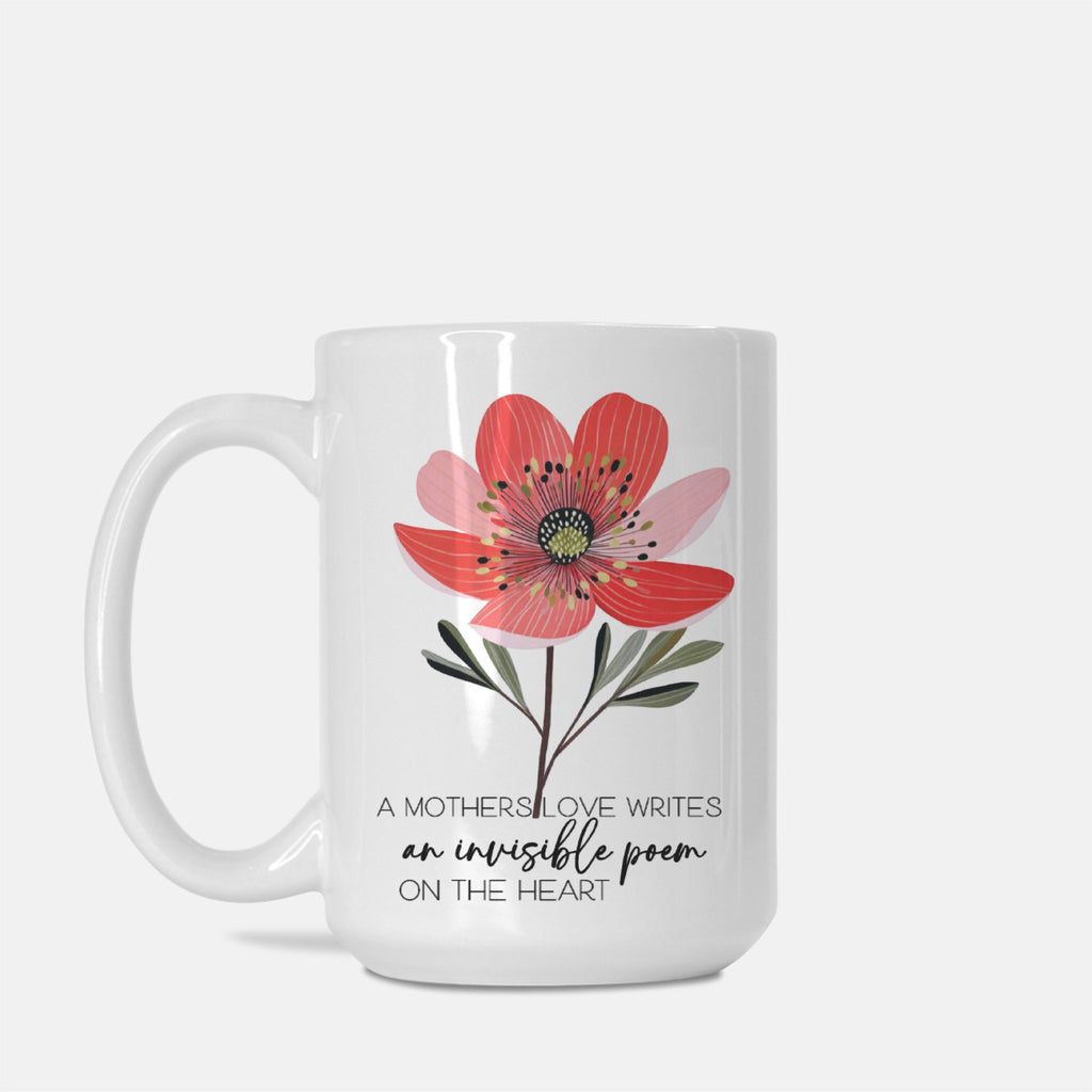 White 15oz. mug with a red flower design and text on a white background