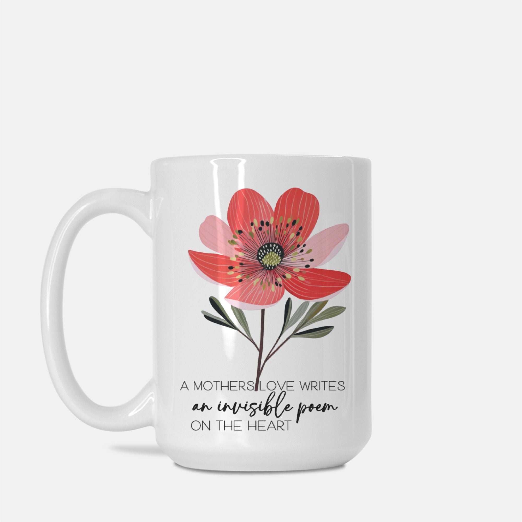 White 15oz. mug with a red flower design and text on a white background