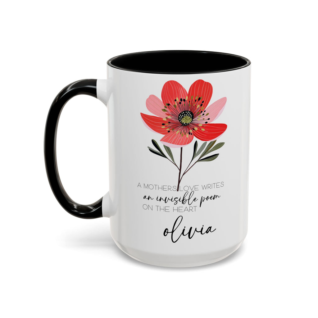 White mug with red floral design and text on a white background