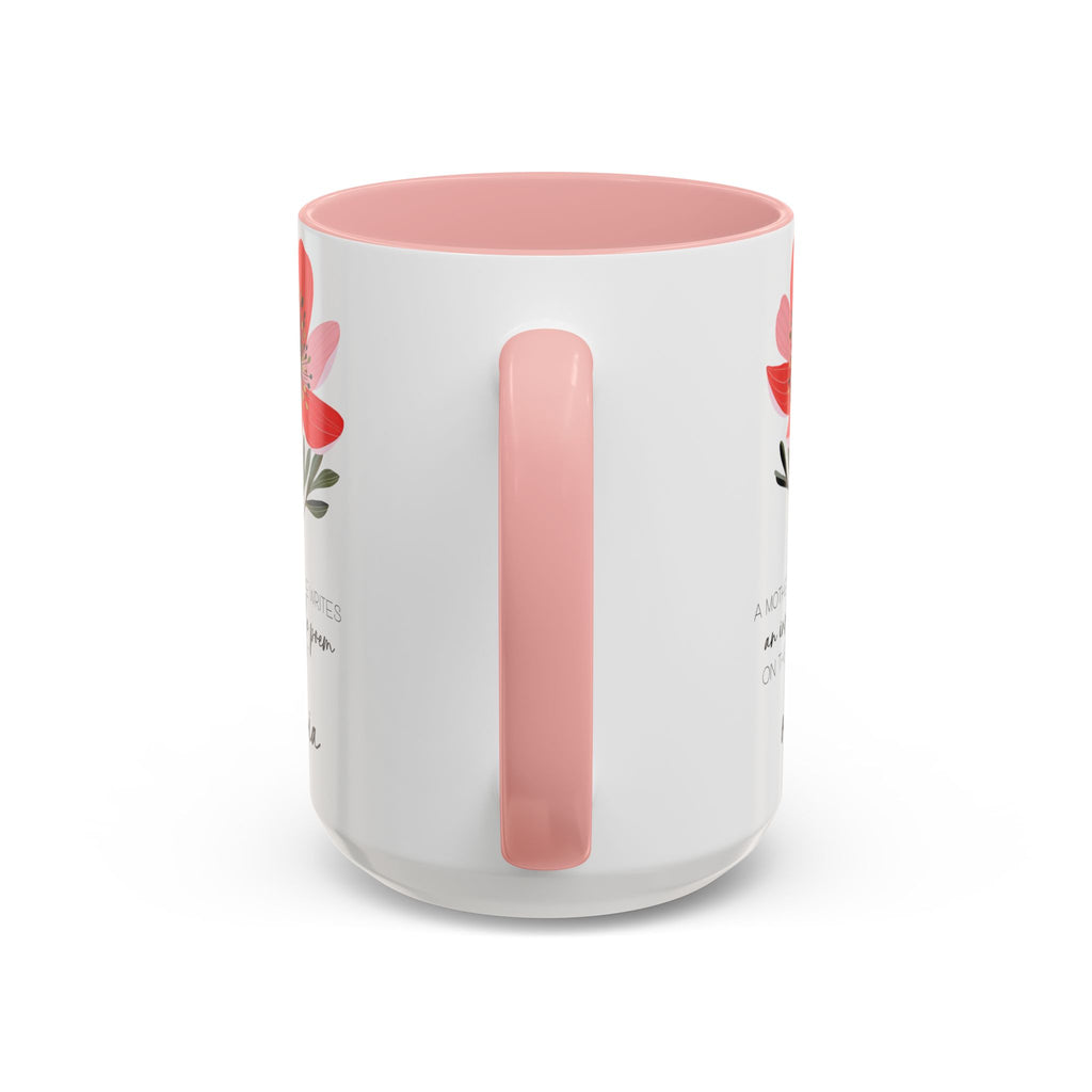 White mug with pink interior and handle, featuring floral designs on a white background