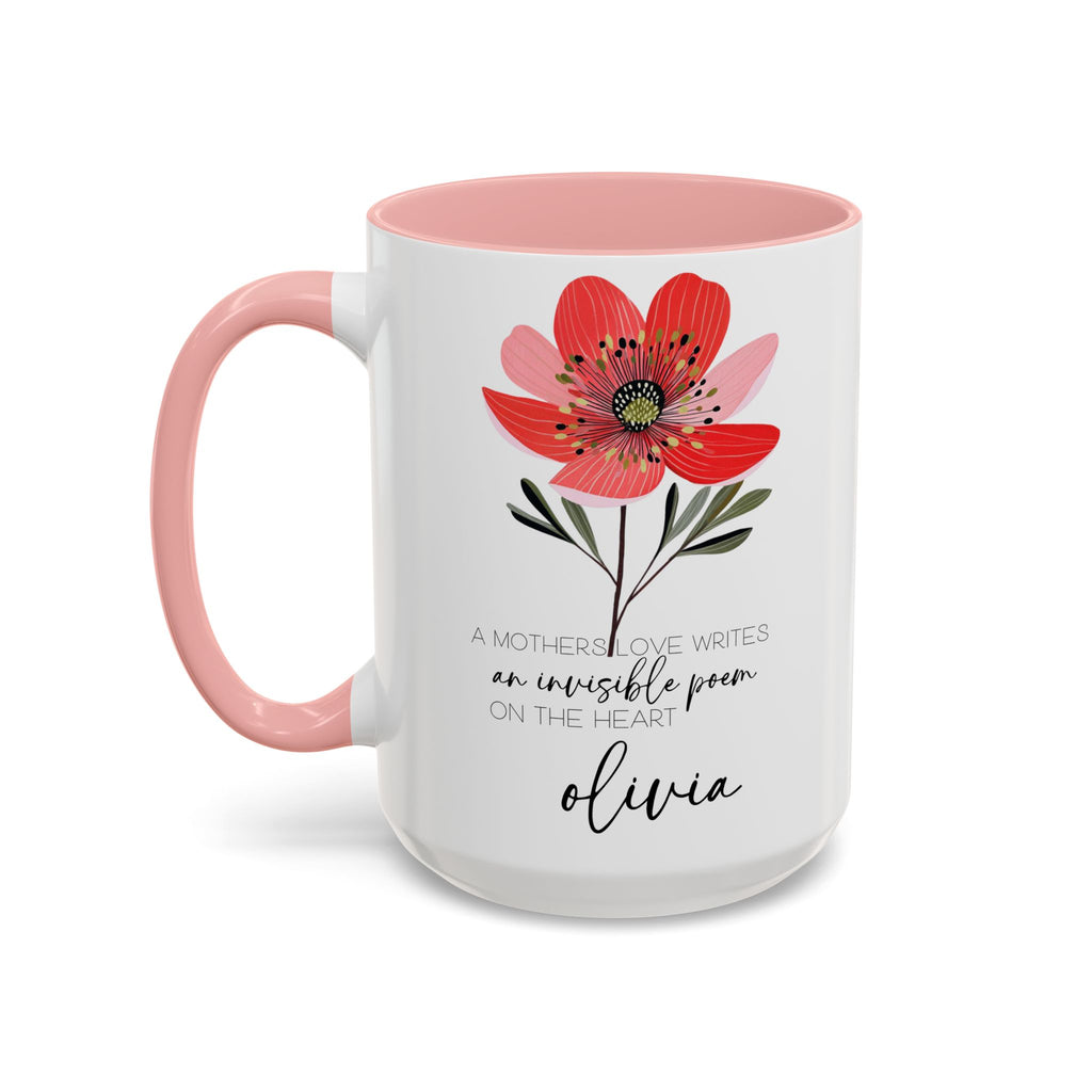 White mug with pink interior and handle, featuring a red flower design and text on a white background.