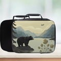Lunch box with bear and nature design on a blurred background