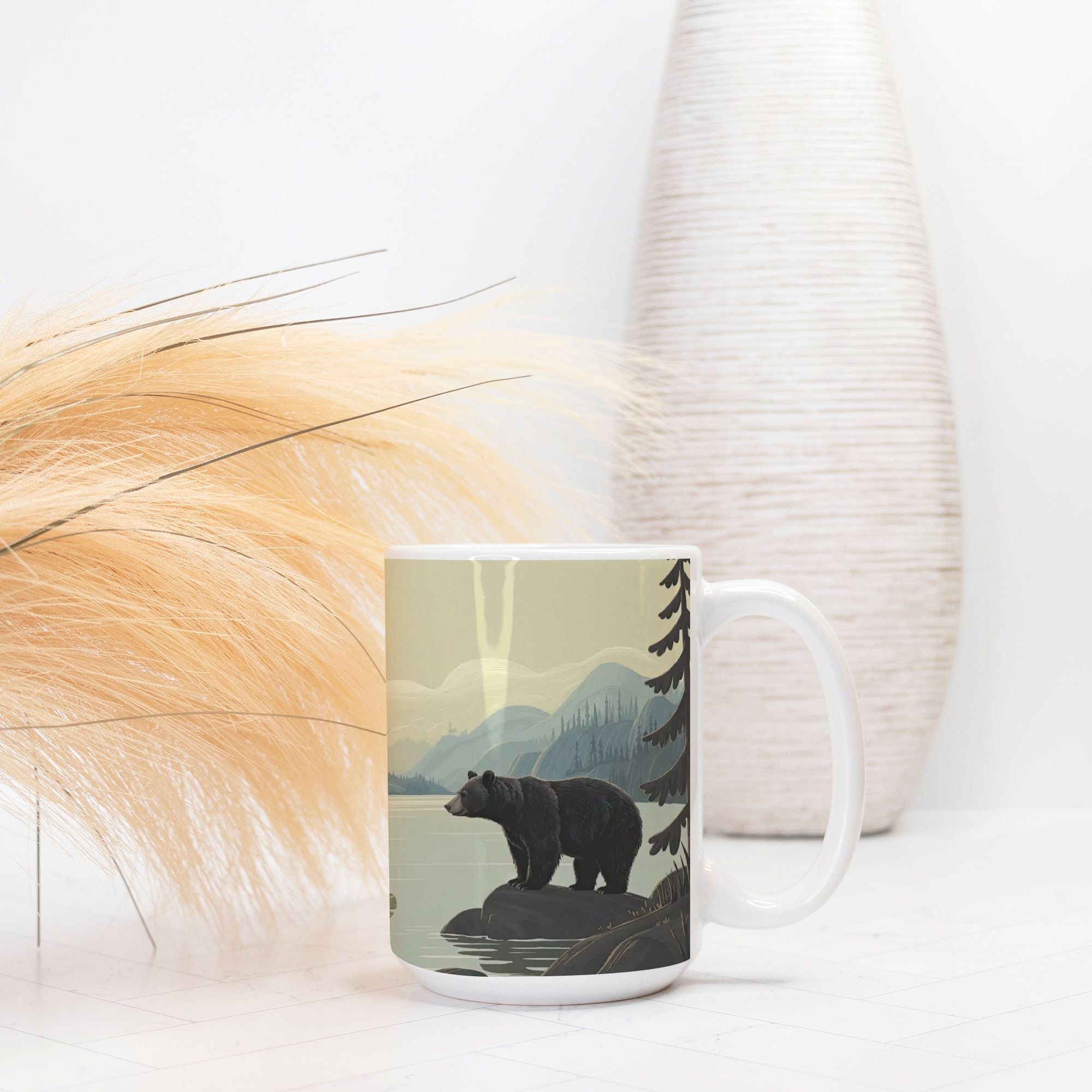 Mug with bear design on a white surface with decorative elements