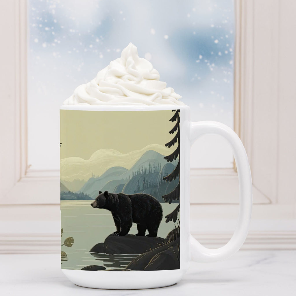 White mug with a bear design on a snowy landscape background