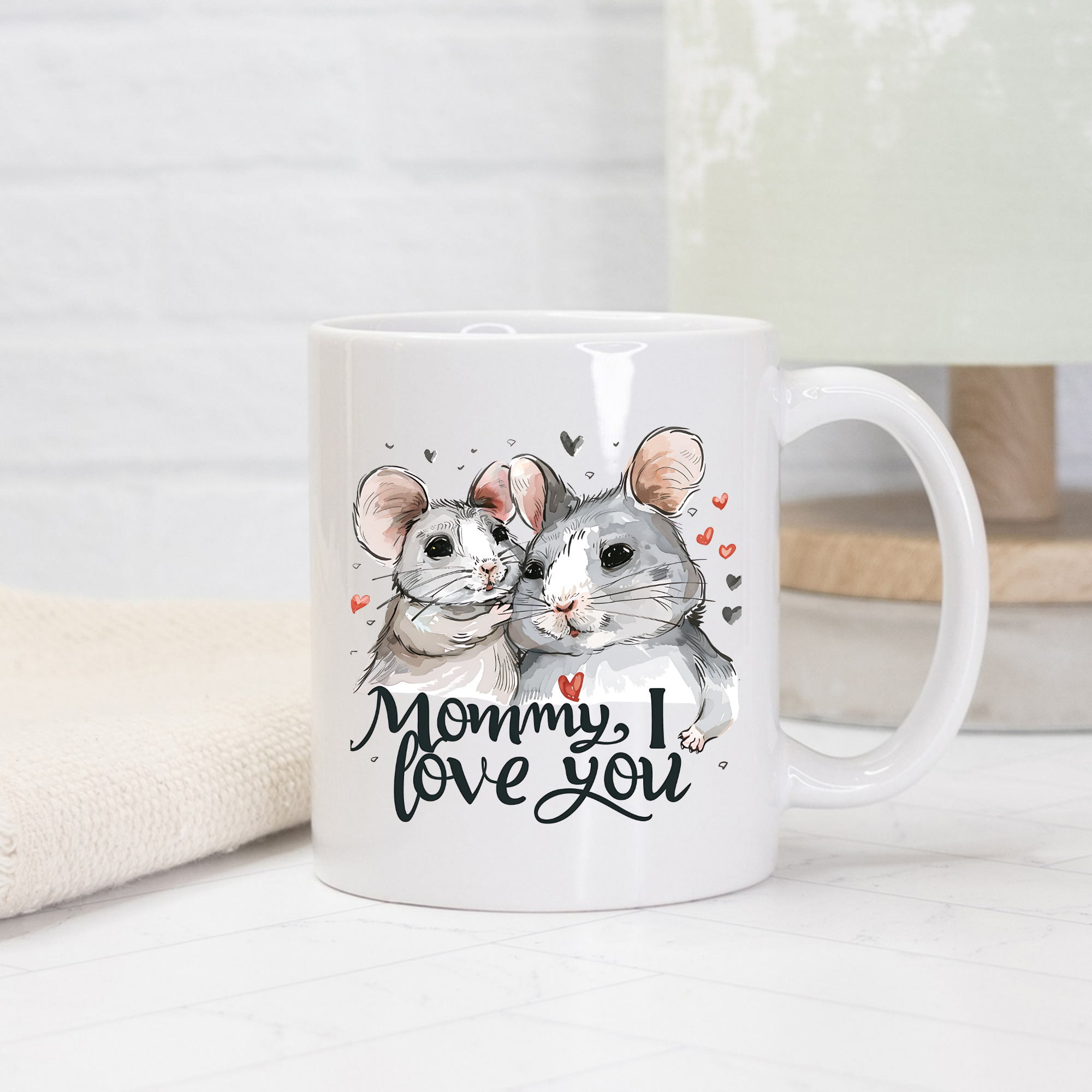 11oz Mug with illustration of two mice and 'Mommy, I love you' text on a white background