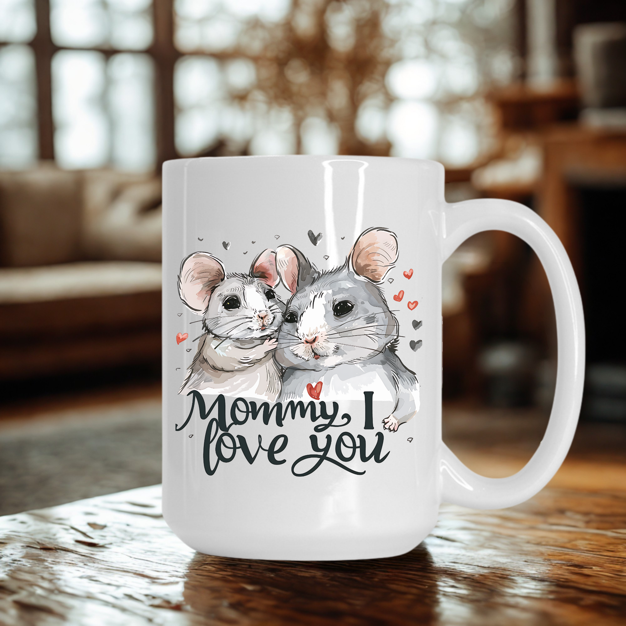 White mug with a design of two rats and 'Mommy, I love you' text on a wooden table.