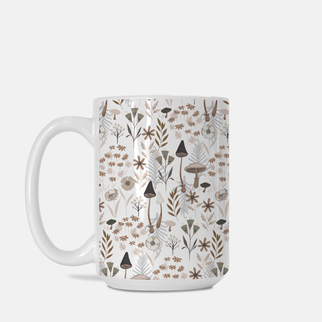 Mug with nature-themed pattern on a white background