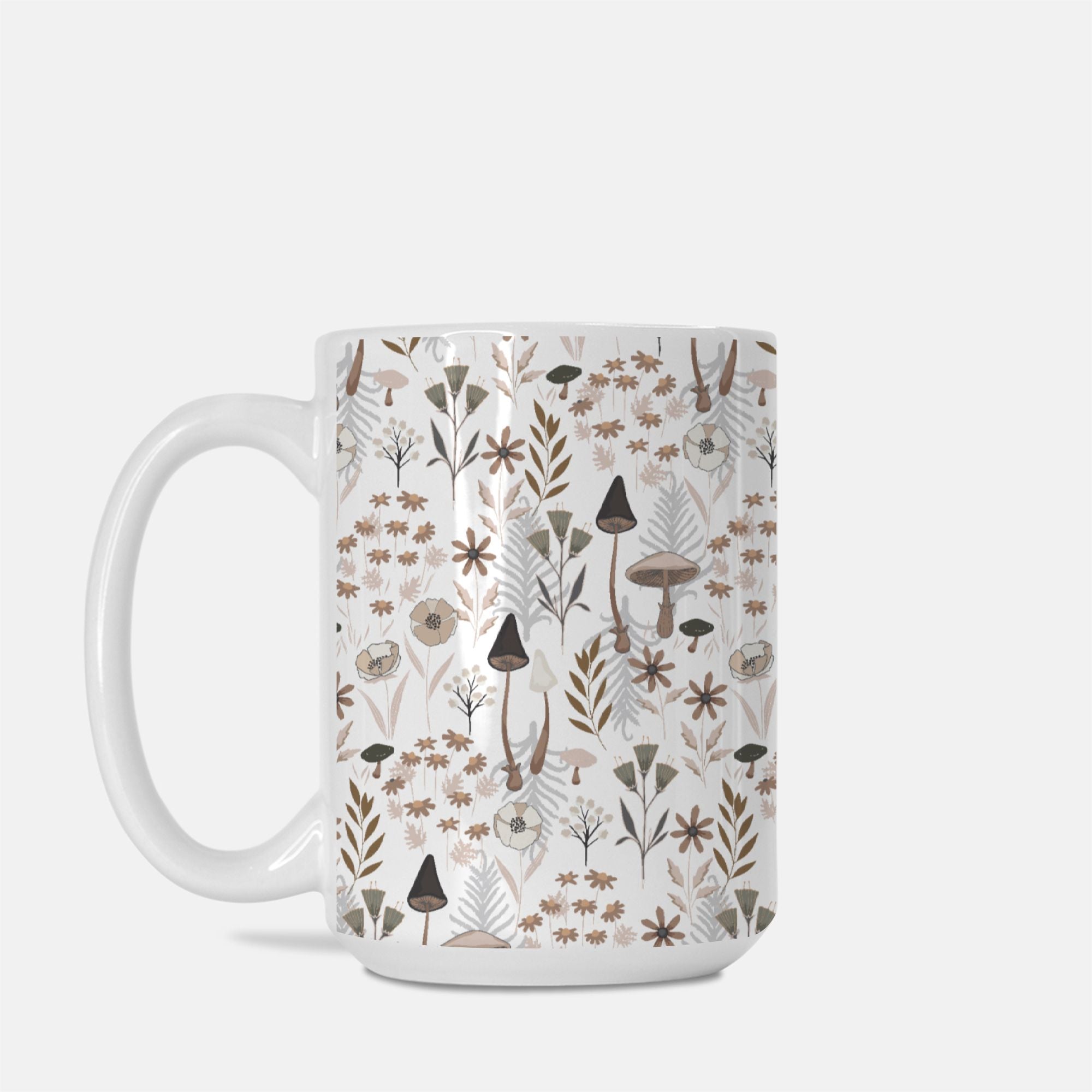 Mug with nature-themed pattern on a white background