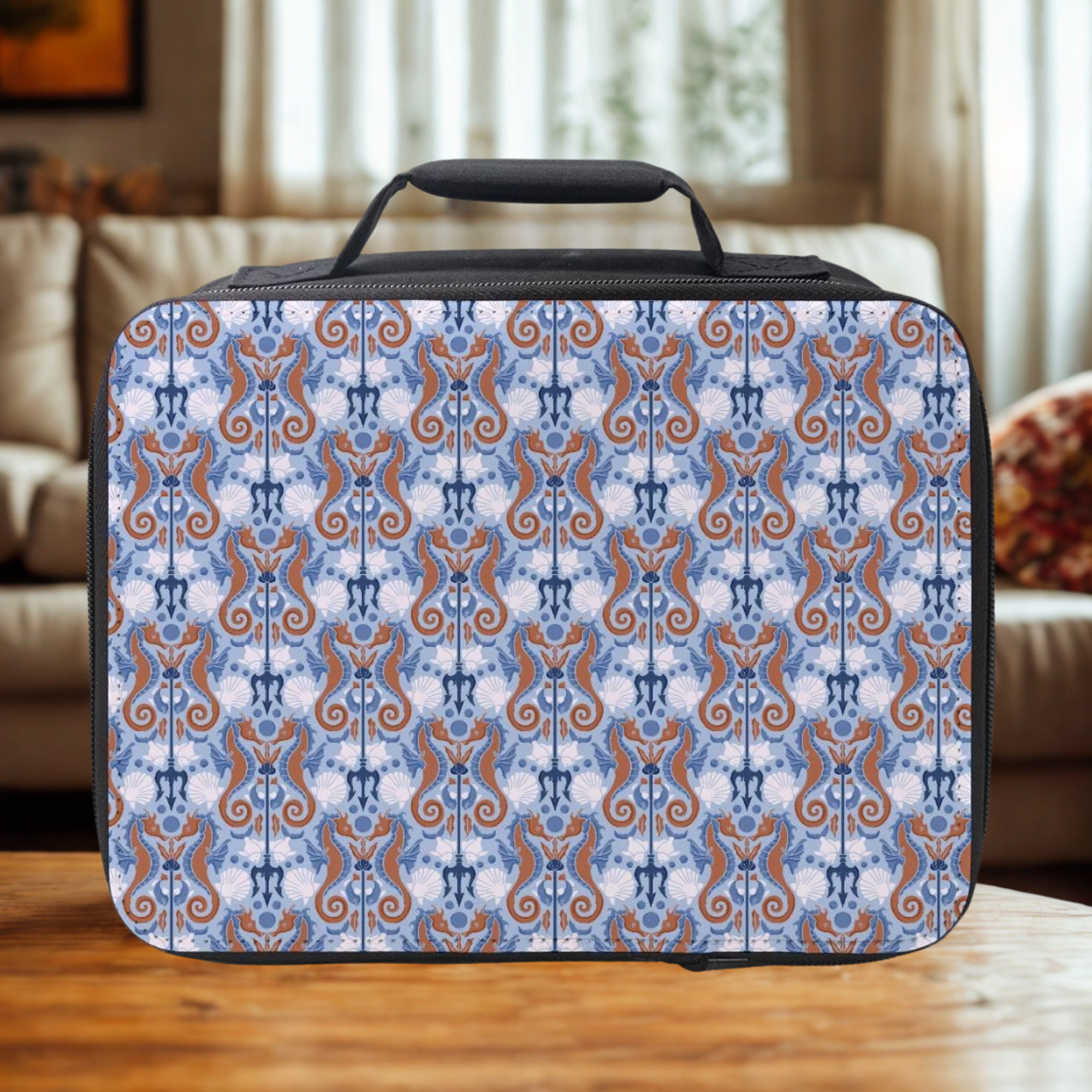 Seahorse Patterned lunch box on a wooden table with a blurred indoor background