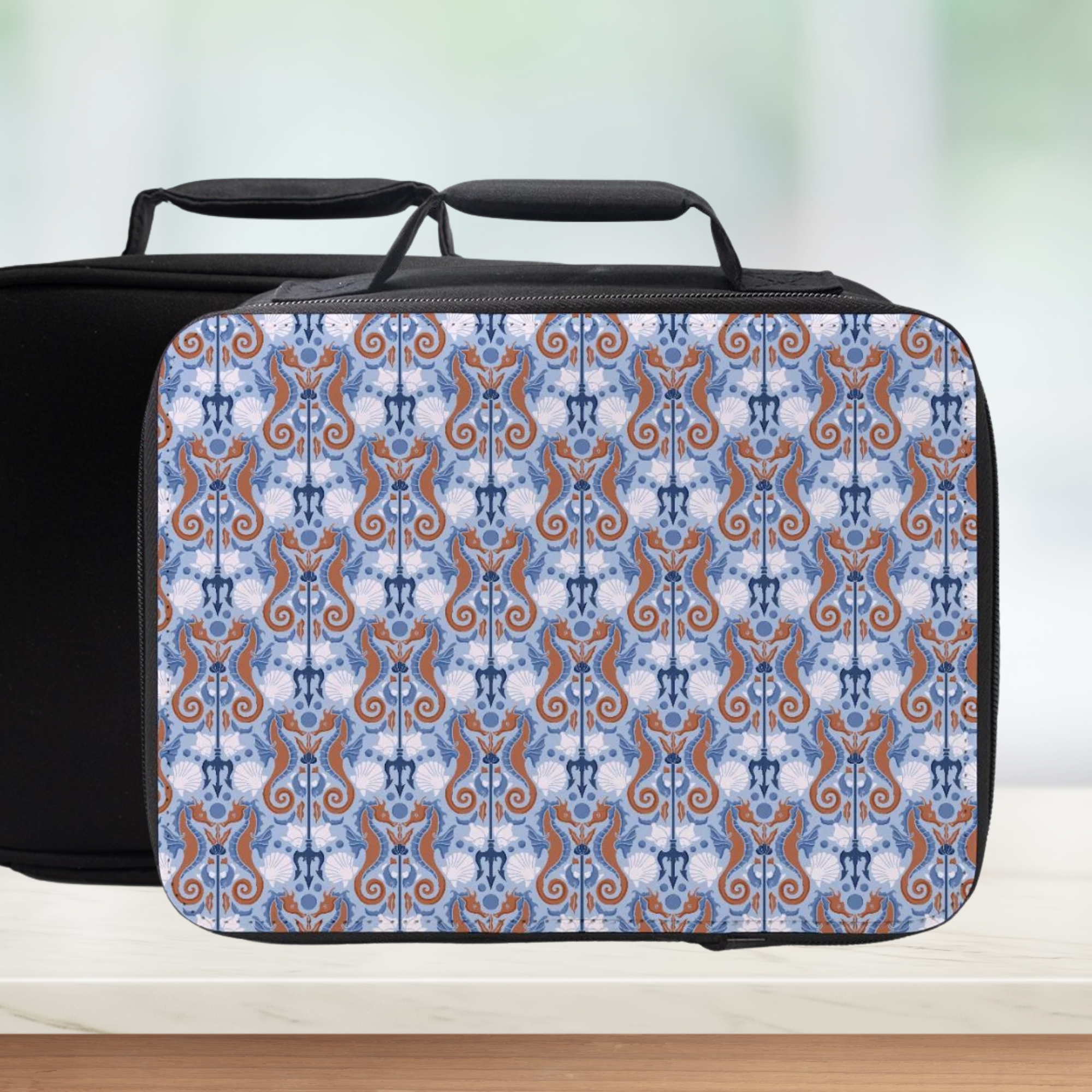 Lunch bag with blue and brown seahorse pattern on a white background