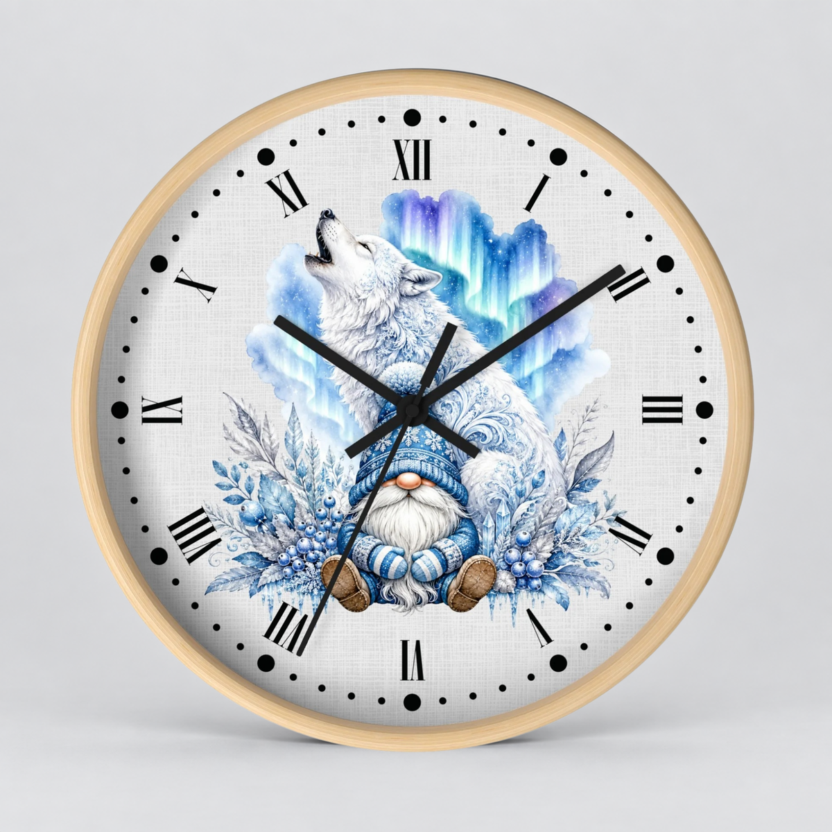 A round wall clock with a light wood frame and a white face featuring a whimsical illustration of a blue-clad gnome surrounded by snowflakes and aurora-like blue and green clouds. The clock uses black Roman numerals and black hands, photographed against a neutral light gray background.