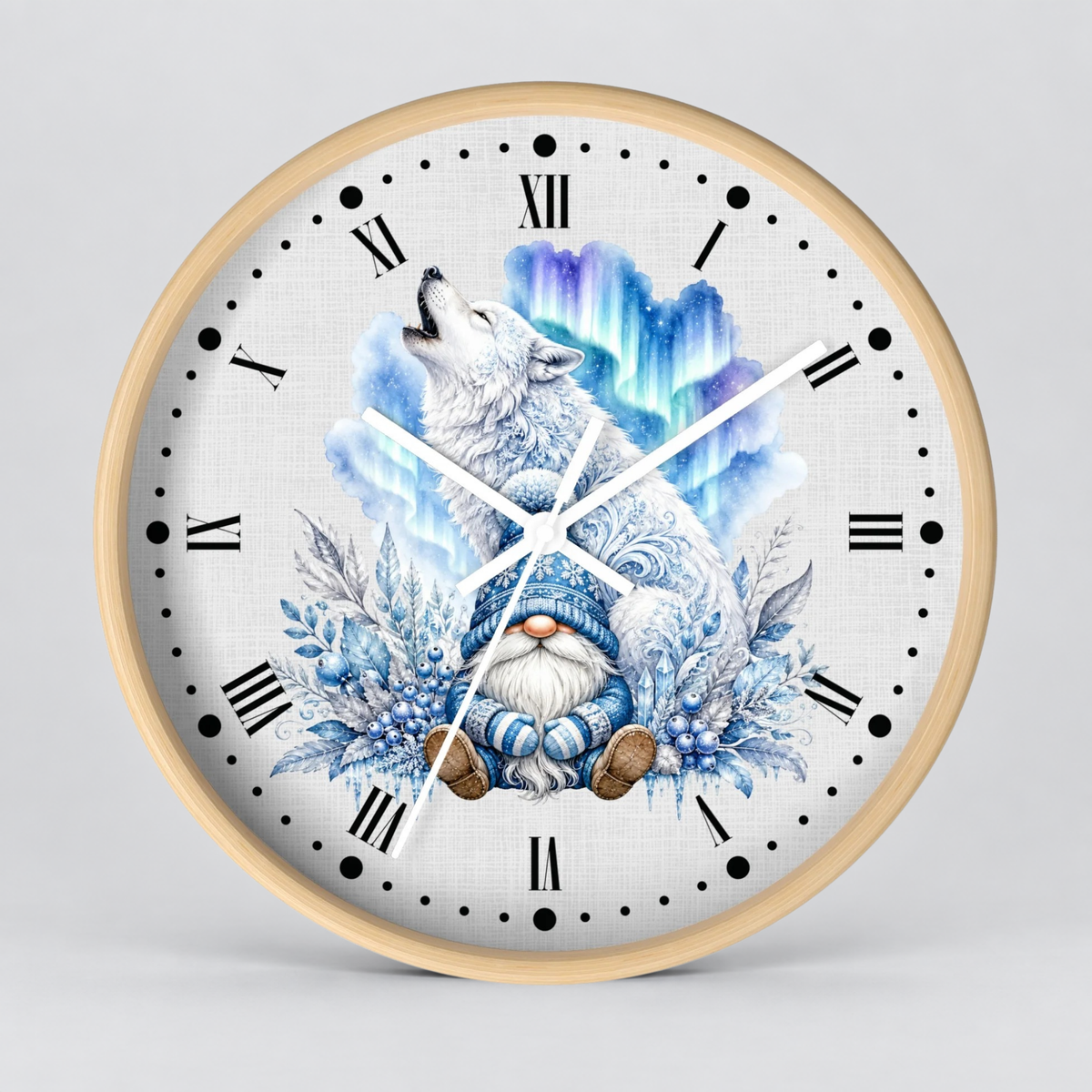 Round wall clock with a light wood frame and a white face featuring a whimsical illustration of a white wolf, a small blue-and-white gnome, aurora-like blue and purple sky, and winter foliage. Black Roman numerals and white hands are visible against a clean light gray studio background.