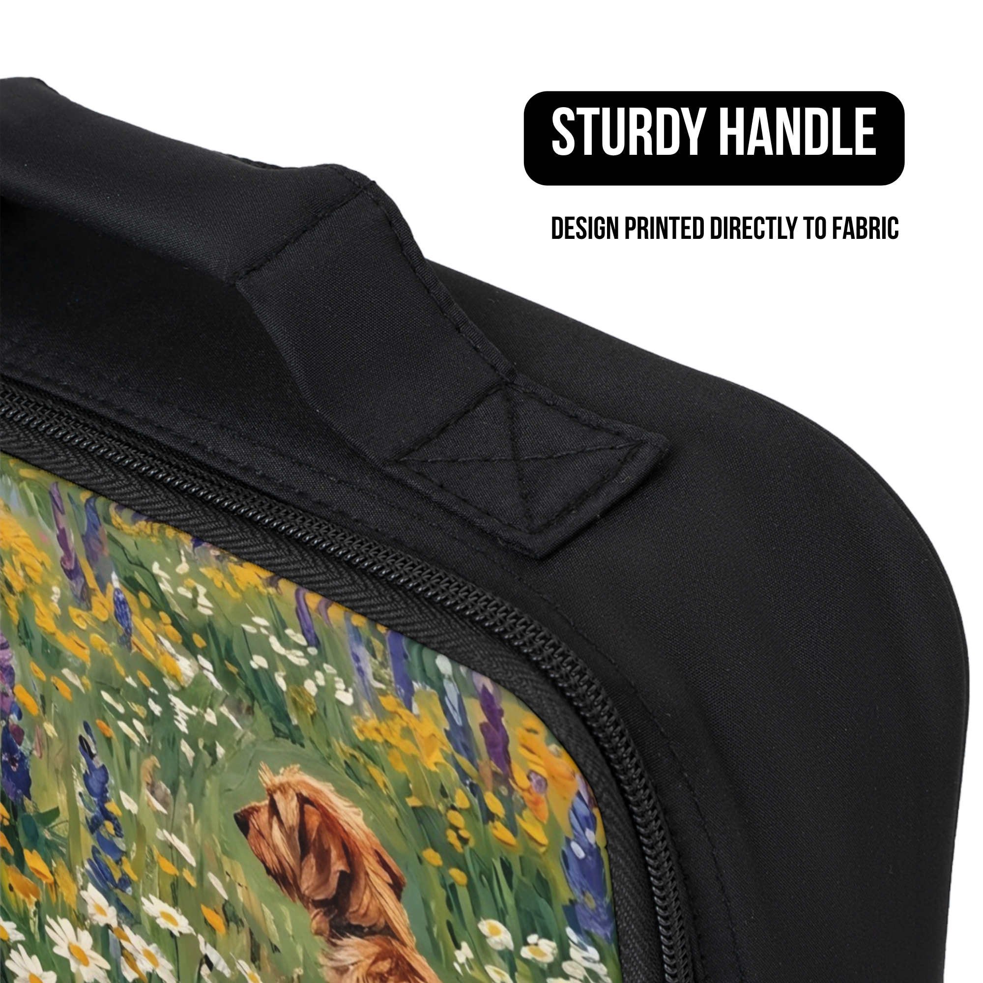 Black lunch bag with a design of a Norfolk terrier dog in a field of flowers, featuring a sturdy handle.