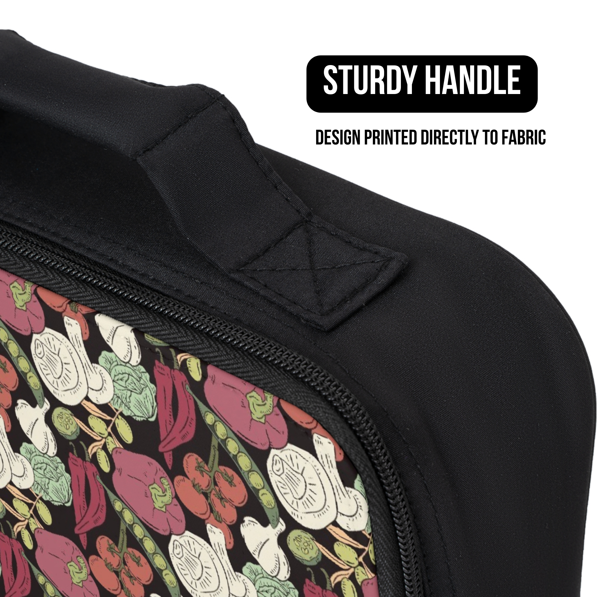 Black lunch bag with vegetable design and text about a sturdy handle and fabric printing.
